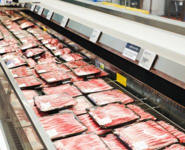 different types of packed meat in the meat cooler different types of packed meat in the meat cooler